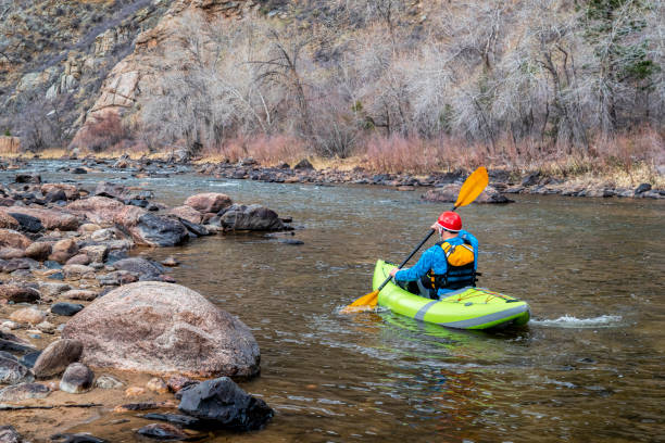 istock senior paddler in  inflatable whitewater kayak 1255020845