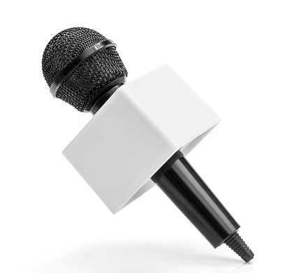 Close-up of black wireless microphone isolated on white background