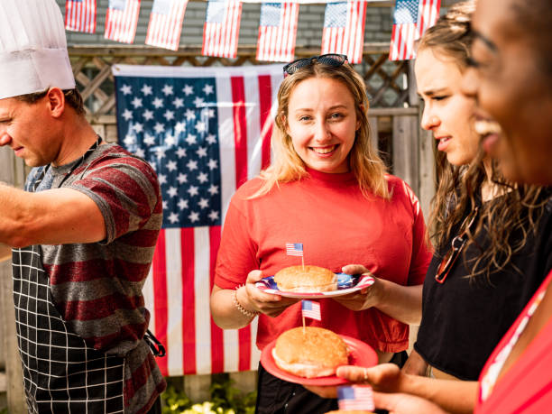istock Burger line up at 4th July BBQ 1255029859