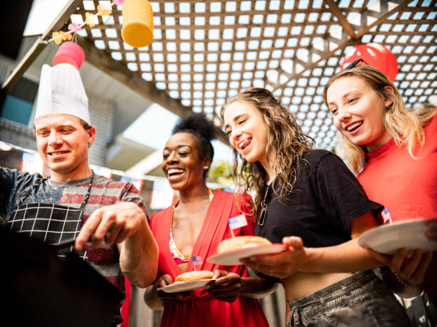 istock Burger line up at 4th July BBQ 1255030787