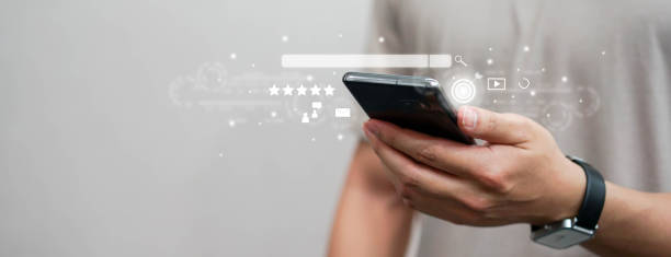 close up man hand touchscreen on smartphone to use search engine optimization (SEO) tools for find customer or promote and advertise about content online for marketing technology and business concept