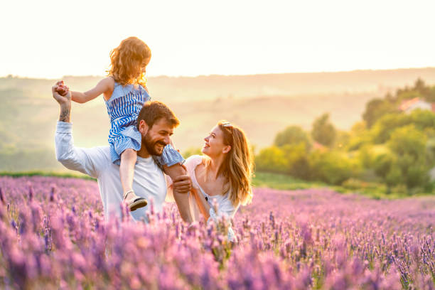 istock Happy family in lavender field 1255032675