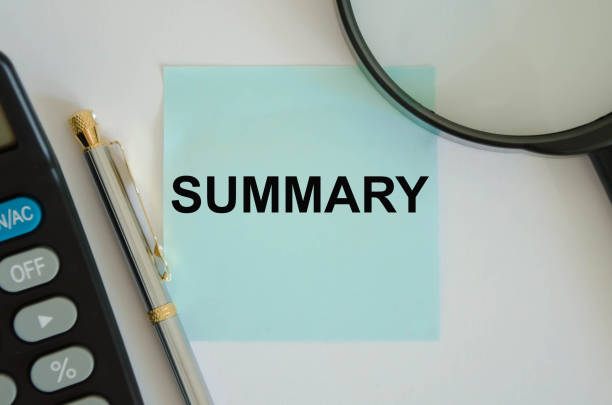 istock text summary written on a blue background near a magnifying glass and and a calculator 1255032709