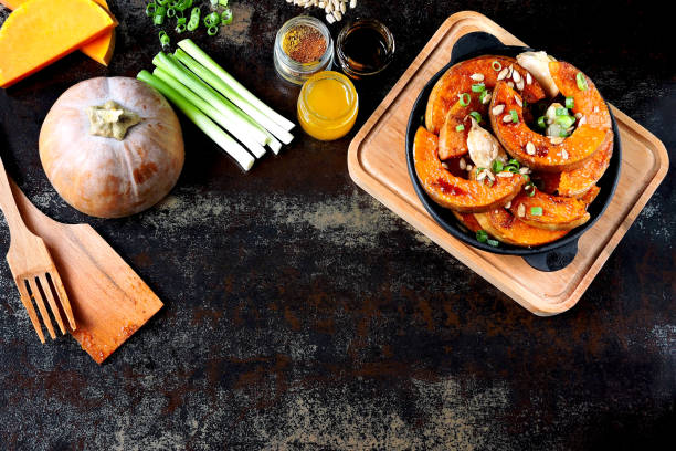 istock Baked pumpkin slices in a small cast iron skillet. 1255034309