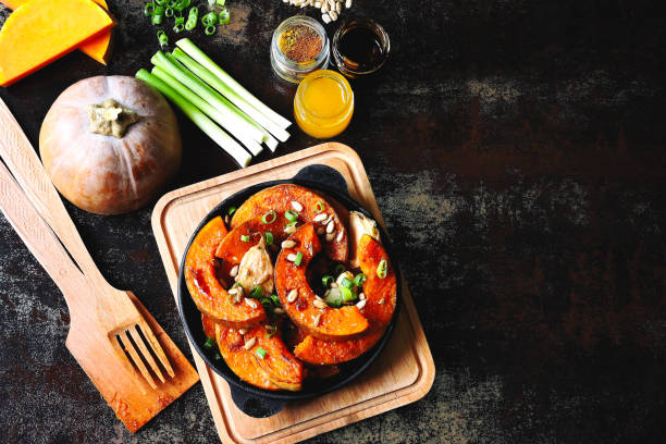 istock Baked pumpkin slices in a small cast iron skillet. 1255034824
