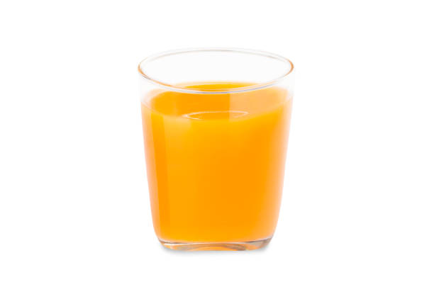 copos de suco de laranja no fundo branco - isolated on white orange juice ripe leaf - fotografias e filmes do acervo