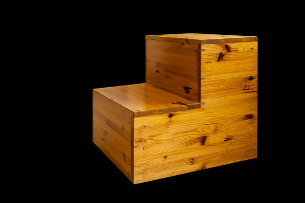istock Wood Stair Step isolated on black backgrpund with clipping path 1255037255