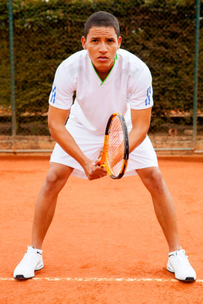 istock Focused young man ready for a tennis game 1255048912