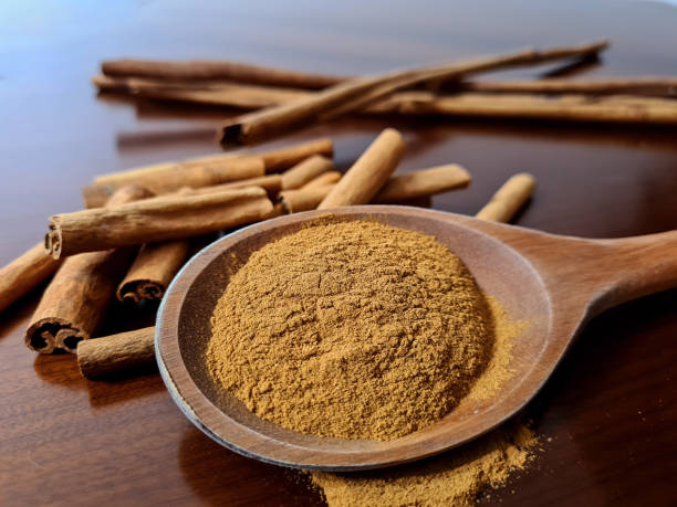istock Cinnamon powder and cinnamon stick. 1255050634