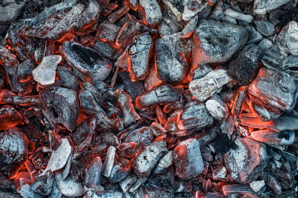 istock Red-hot firebrands in a bonfire. 1255062347