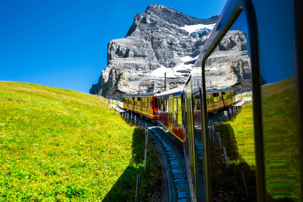 schweizer alpenerfahrung - swiss culture european alps eiger mountain range stock-fotos und bilder