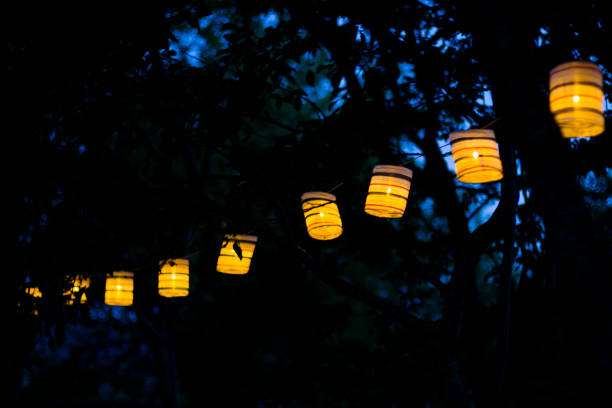 istock Lantern in the yard, night and warm light, hanging lanterns, natural light, evening time. 1255063918