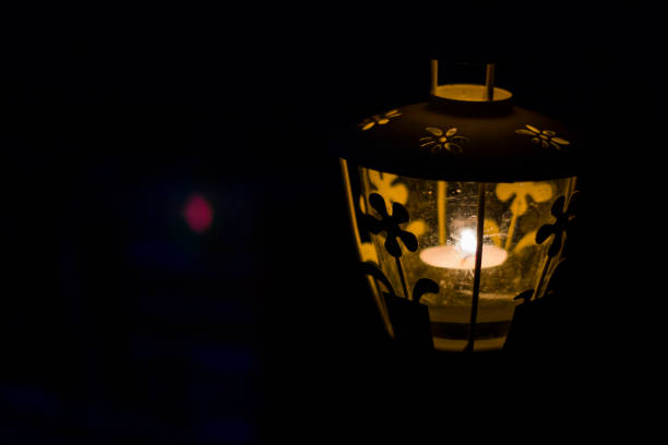 istock Lantern in the yard, night and warm light, hanging lanterns, natural light, evening time. 1255064043