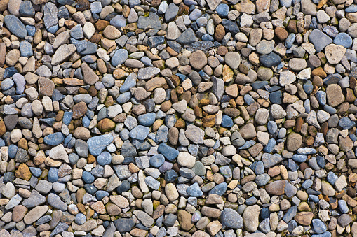 Colourful pebble stones background texture