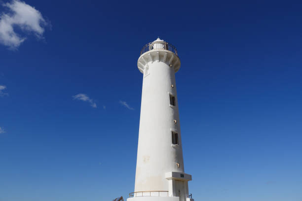 istock White Nomazaki Lighthouse towering towards the blue sky 1255065314