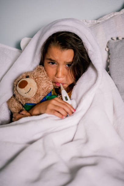 istock Young Sick Girl 1255067090
