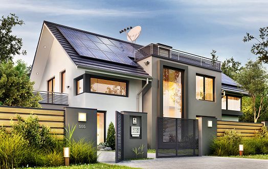 Casa moderna con paneles de jardín y solares photo