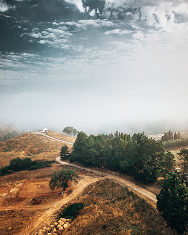 foggy countryside in tuscany at summer