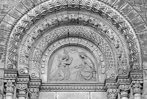 Prague - The relief of Annunciation on the portal of the church kostel Svatého Cyrila Metodeje by Václav Levý (1867 - 1869)