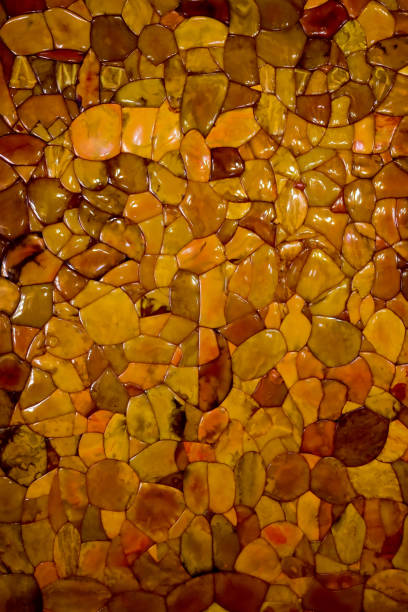 istock Golden amber stone texture background 1255076454