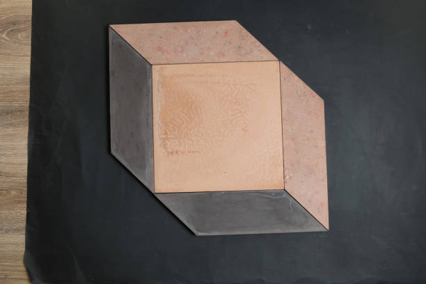 istock A sample of ground, wall stone shape on the unicolour background 1255080495