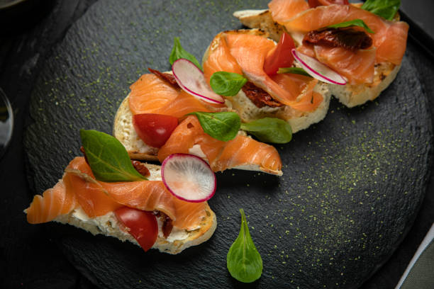 istock Italian bruschetta, with soft cheese and salmon 1255081657