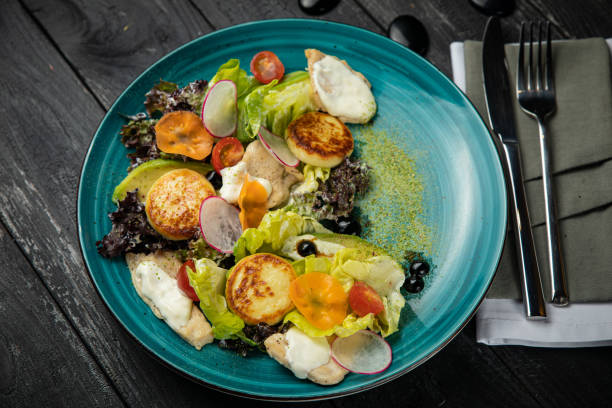 istock Hearty breakfast with cheesecakes, meat, berries, 1255081942