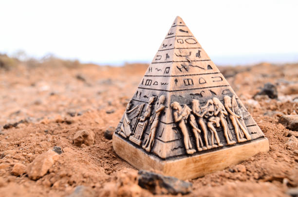 Egyptian Pyramid Model Miniature Egyptian Pyramid Model Miniature in the Rock Desert hieroglyphics photos stock pictures, royalty-free photos & images