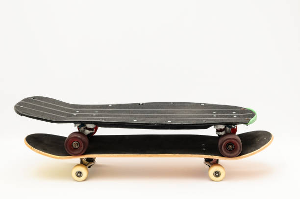 istock Old Used Wooden Skateboard 1255083418