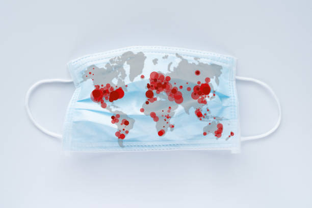 istock World map showing coronavirus infected countries on face mask 1255084689