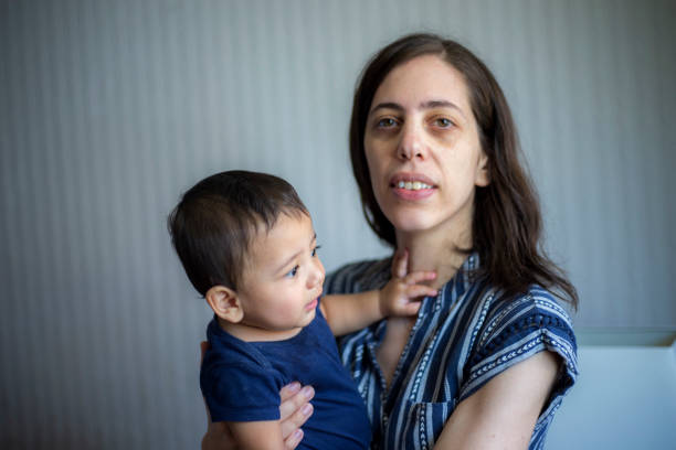 istock Mother and son portrait at home 1255086343