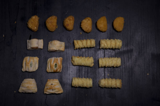 istock Appetizers on a black wooden surface 1255090772