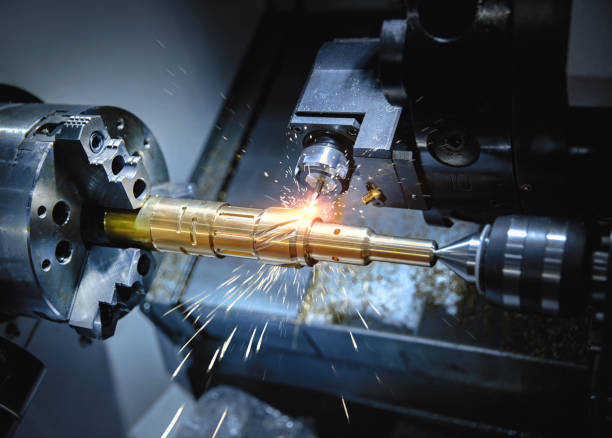 Metal working 1. Metal machine tools industry. CNC turning machine high-speed cutting is operation.flying sparks of metalworking rebar production stock pictures, royalty-free photos & images