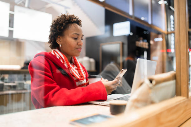 istock Woman at work checking phone. 1255098963