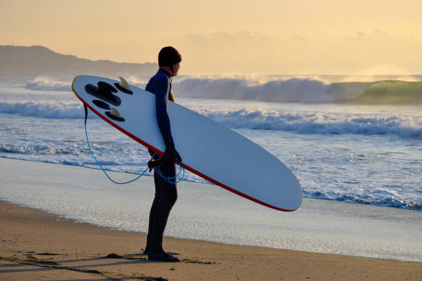 istock Surfer on Blue & green Ocean Wave riding a surfboard 1255102544