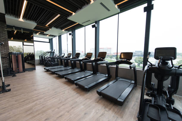 istock Large Modern Gym With Workout Equipment 1255103906