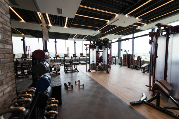 istock Modern Gym Interior With Equipment 1255103923