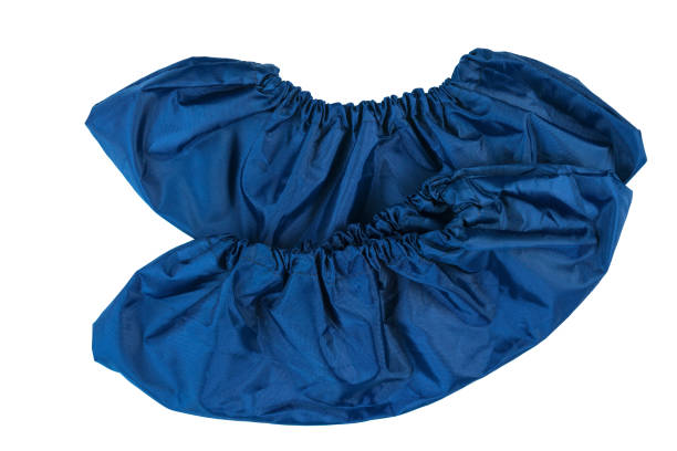 istock Reusable eco-friendly shoe covers, zero waste concept on white background 1255104083
