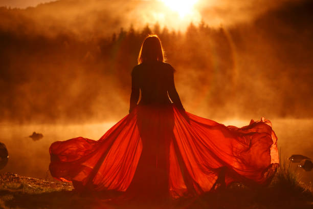 istock Walking at sunset at the lake 1255109480