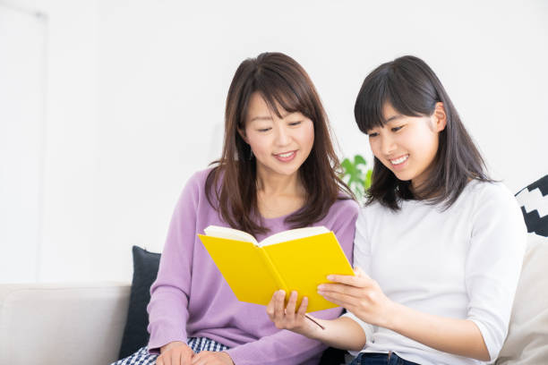 istock asian parent and daughter 1255110671