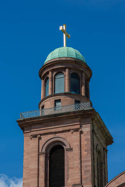 istock Church bell tower and blue sky 1255117675