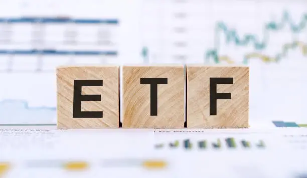 Photo of Wooden Text Blocks of ETF. Business and financial concept