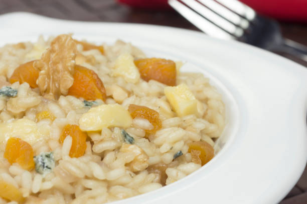 istock Gorgonzola cheese risotto with damascus and walnuts  close 1255138773