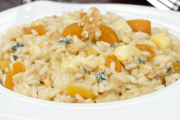 istock Gorgonzola cheese risotto with damascus and walnuts 1255138934