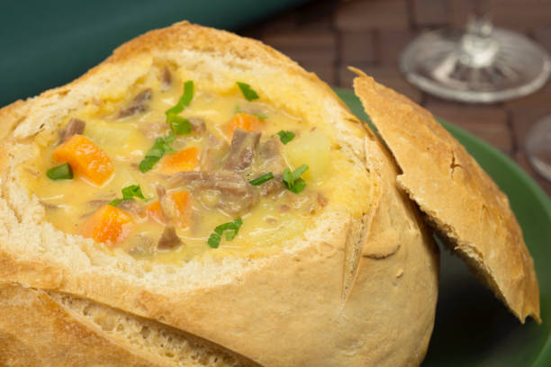 istock Meat and vegetable soup served in Pagnotta Italian bread 1255139105
