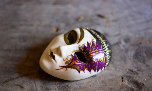 istock the mask on the wooden table 1255141179