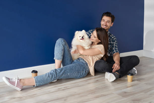 istock Couple in their new empty house 1255142982