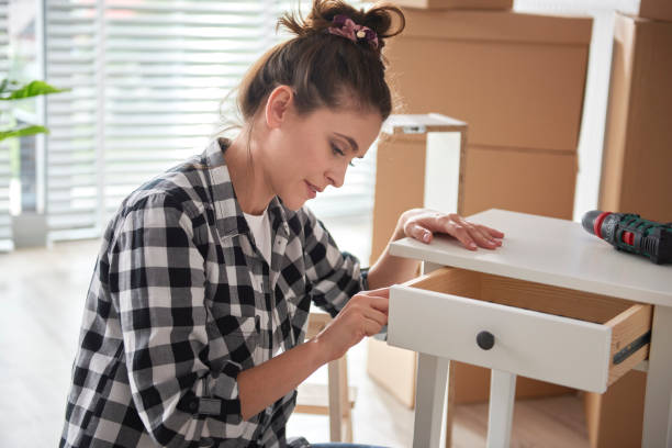 istock Focus woman renovating a night table 1255144597