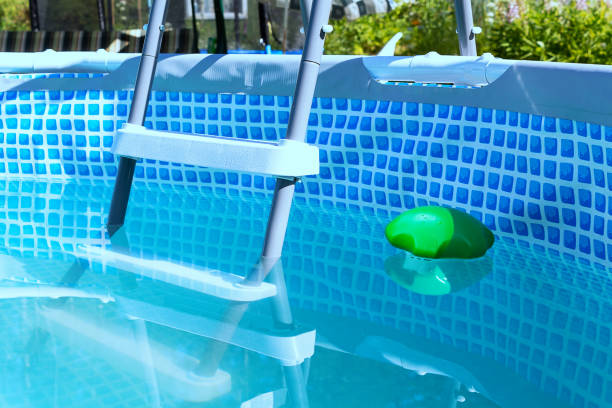 istock Swimming pool pipe technology. Country pool filtration. 1255147198