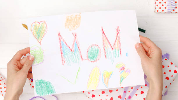 istock Top view of kid's drawing greeting card 1255153369